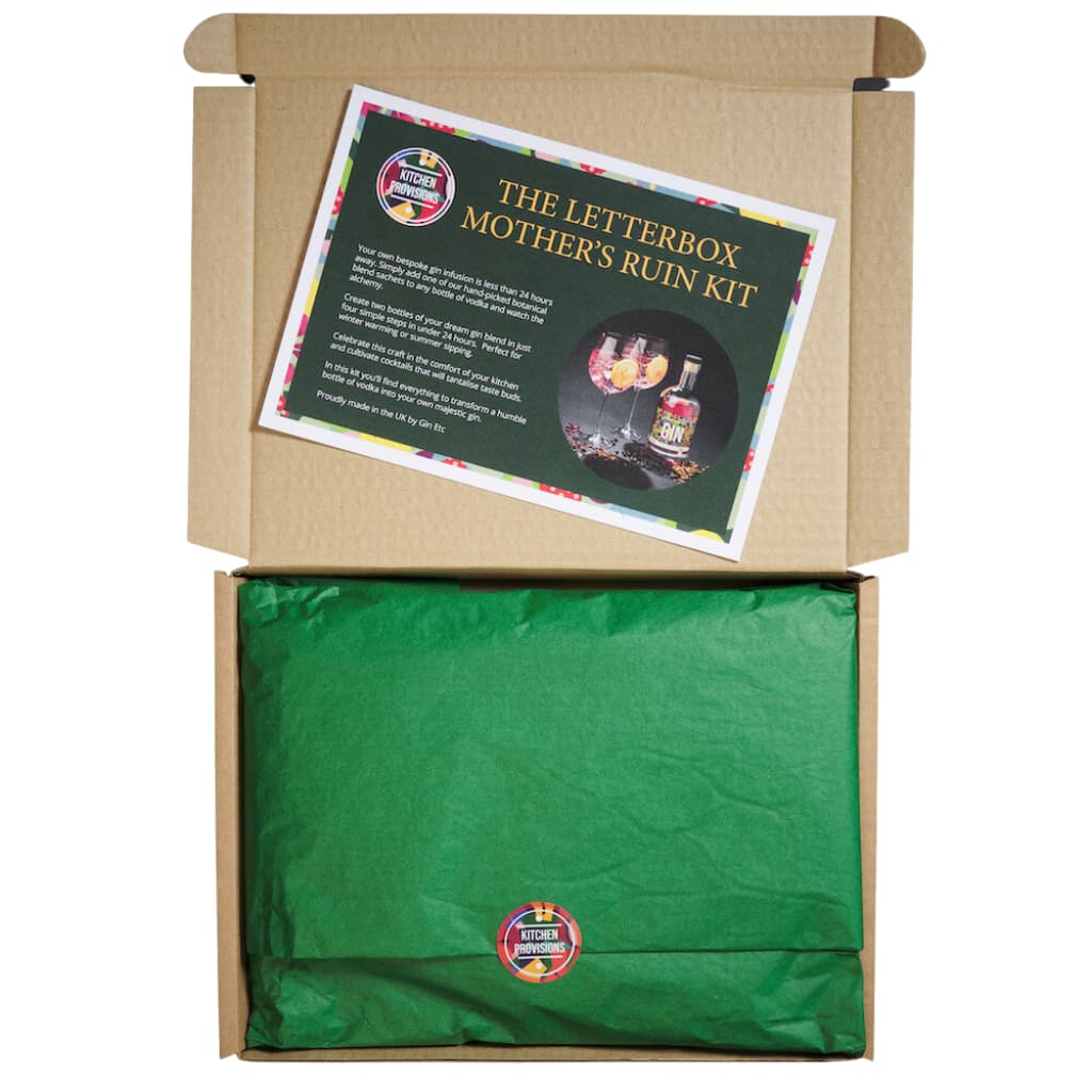 Letterbox Gin Making Kit - Mothers Ruin box partly open showing neatly wrapped contents in green tissue paper