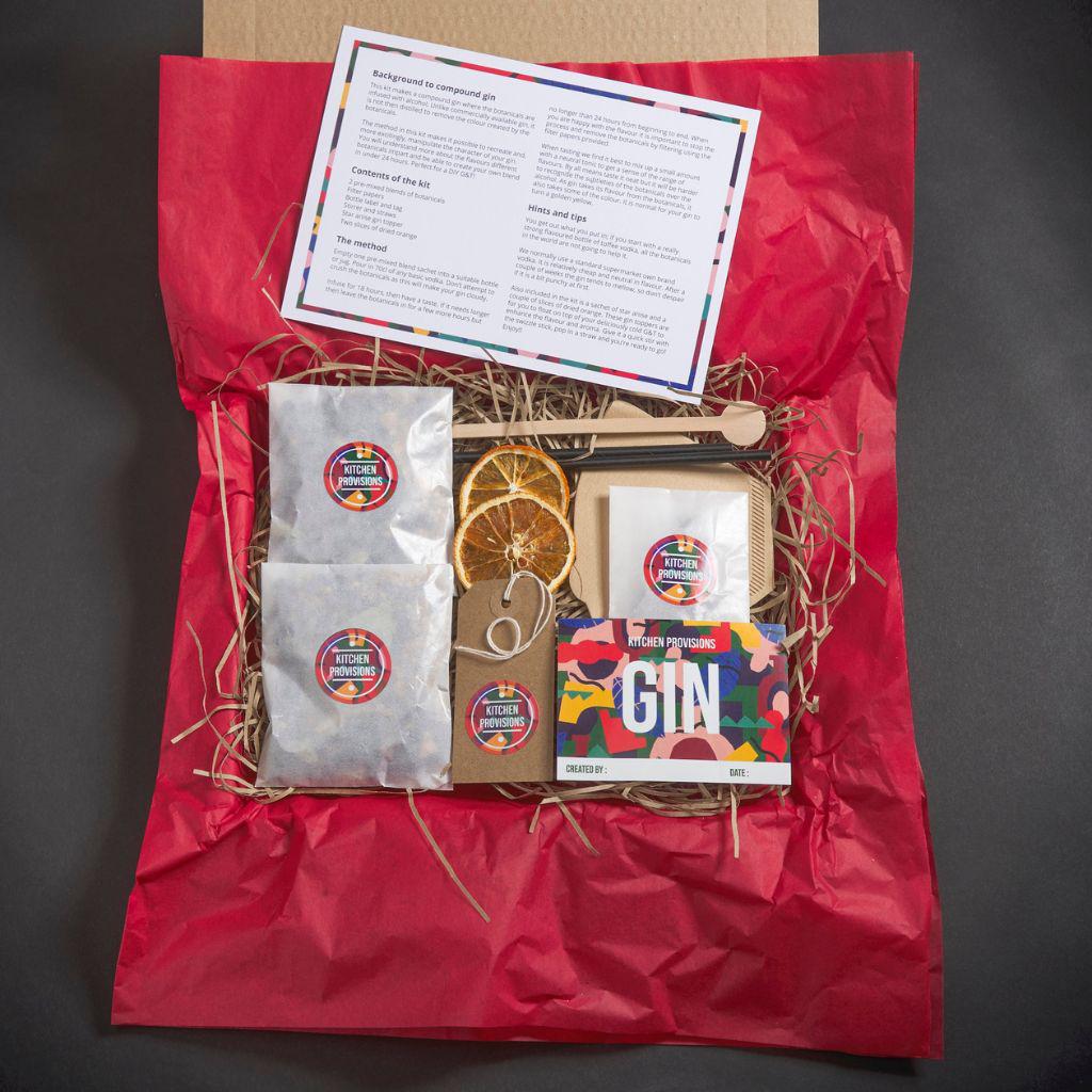 Gin Maker Letterbox Gin Making Kit Gift showing tissue paper open and contentrs inside 